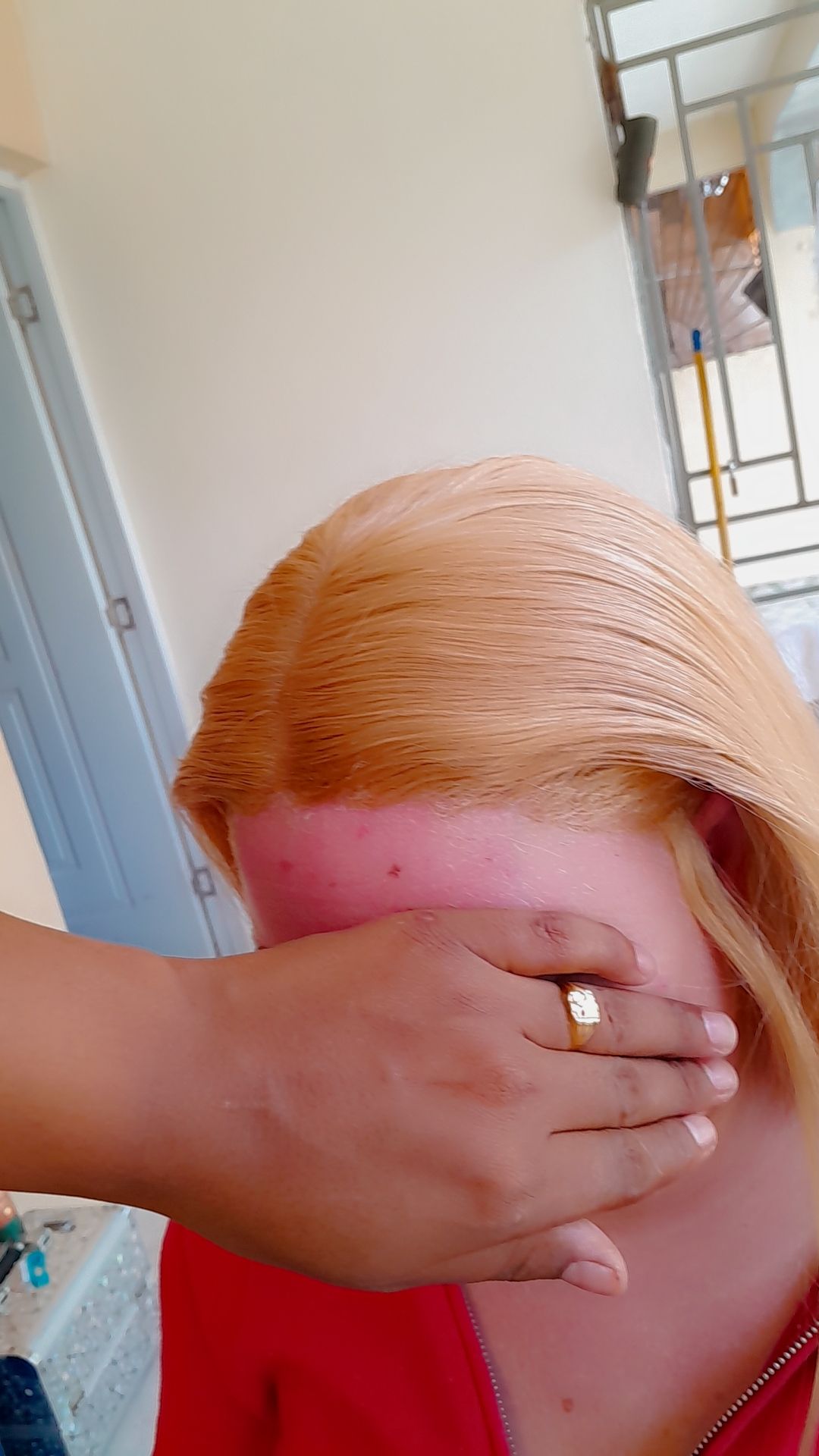 postura de peluca
